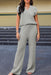 Elegant Knit V Neck Sweater and Flowing Trousers Ensemble