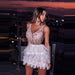 Elegant V-Neck Beaded Mini Dress with Feather Accents for Special Occasions