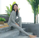 Cozy Women's Modal Pajama Set with Long Sleeve Top and Pants for Relaxation and Sleep