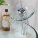 Elegant Blue Glass Vessel Sink Ensemble with Waterfall Faucet