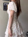 Vintage White Corset Dress with Cherry Blossom Print – Ruffled Hem & Lantern Sleeves