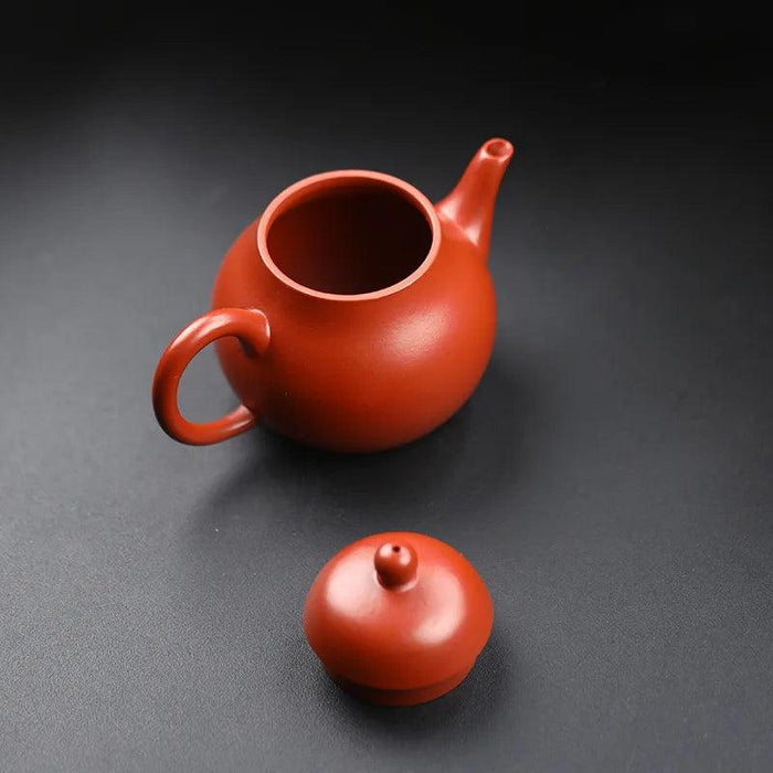 Elegant Purple Clay Teapot with Golden Accents for Refined Tea Enjoyment