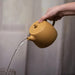 460ML Yixing Zisha Clay Teapot with Elegant Gold Detailing for Tea Lovers