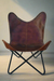 Vintage Brown Leather Butterfly Chair: Elegant Sleeper Lounge for Stylish Home and Outdoor Relaxation