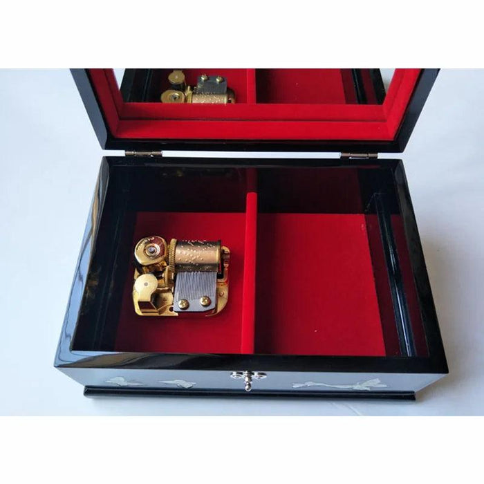 Charming Musical Jewelry Box with Pearl Inlays and Floral Elegance