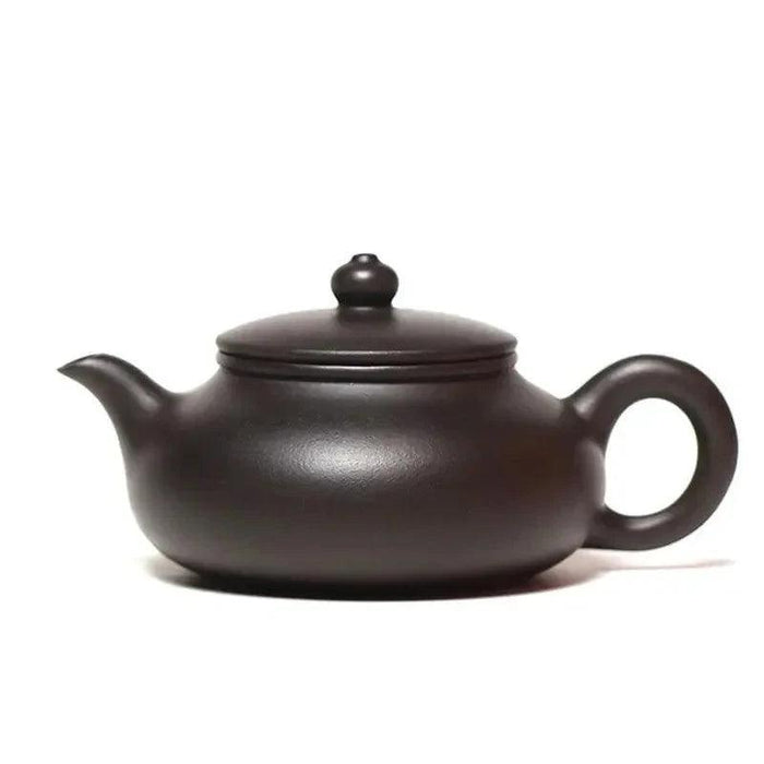 Handcrafted 140ml Yixing Purple Clay Teapot - Exquisite Zisha Kettle for Passionate Tea Aficionados