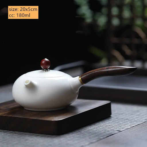 Exquisite Handcrafted Dehua White Porcelain Teapot with Integrated Filter - Refined Chinese Tea Set for Home and Travel