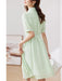 Summer Elegance: Light Green Smocked A-Line Dress with Belt