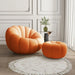 Versatile Rotating Pumpkin Plush Chair - Stylish Lounge Seating for Modern Spaces