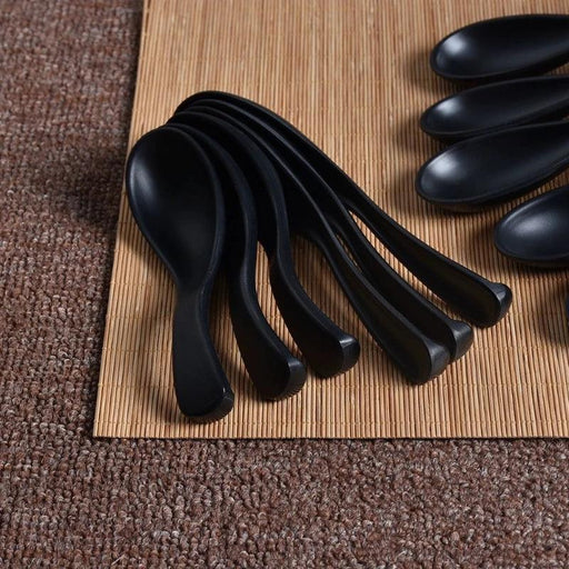 Sophisticated Black Melamine Serving Spoon with Elegant Japanese Porcelain Motif