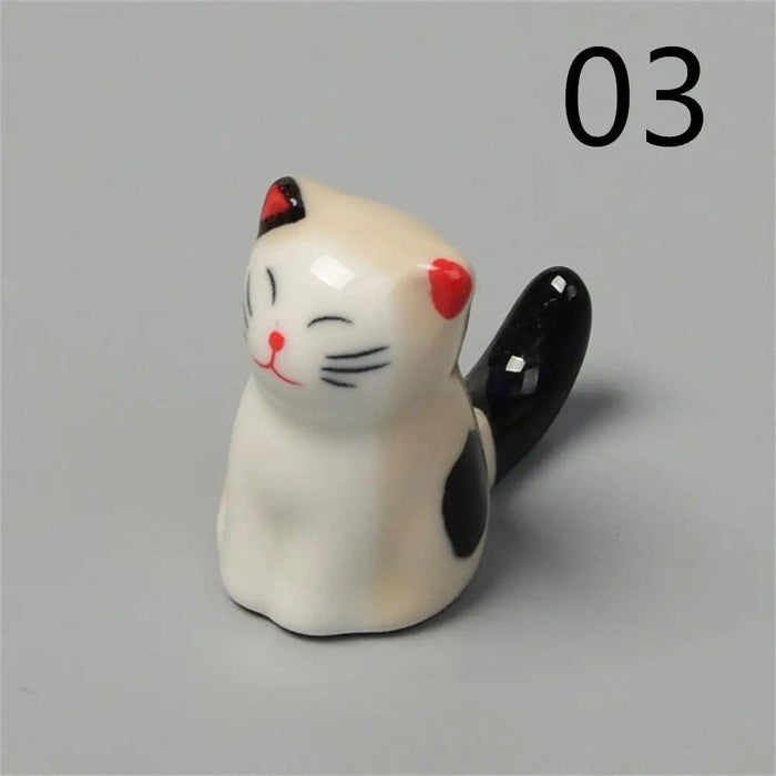 Playful Cat Cutlery and Chopstick Holder for a Whimsical Kitchen