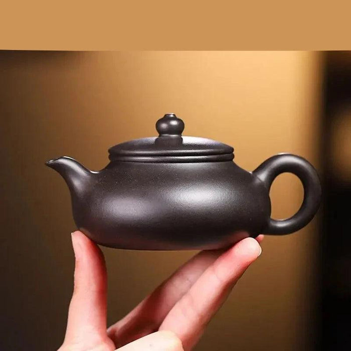 Handcrafted 140ml Yixing Purple Clay Teapot - Exquisite Zisha Kettle for Passionate Tea Aficionados