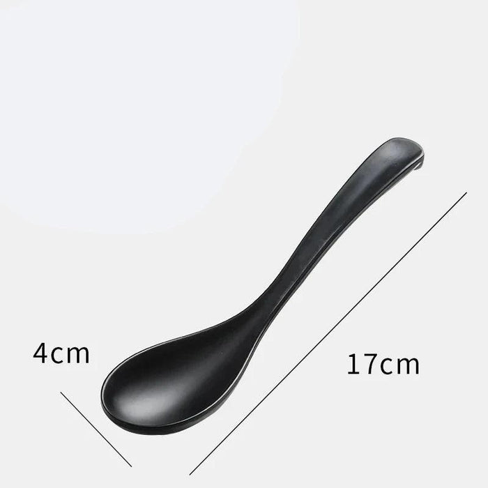 Sophisticated Black Melamine Serving Spoon with Elegant Japanese Porcelain Motif