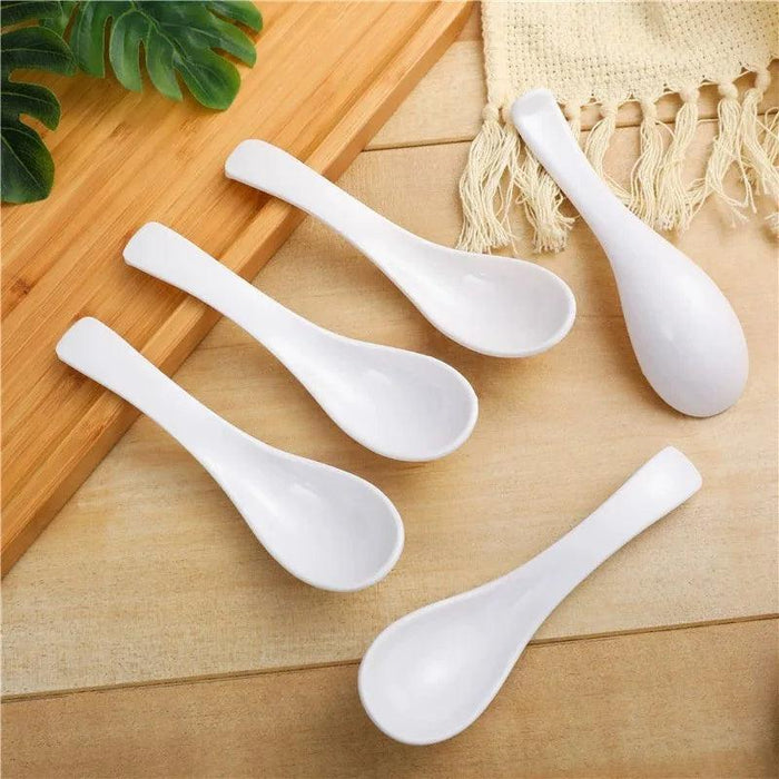 Sophisticated Black Melamine Serving Spoon with Elegant Japanese Porcelain Motif