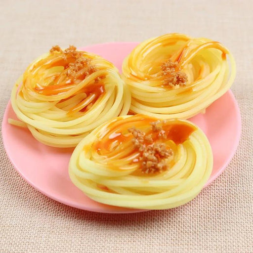 Realistic Faux Pasta Display for Culinary Decor and Inspiration