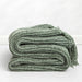 Charming Chenille Knit Throw Blanket with Delightful Pompoms - Cozy Elegance for Your Living Space