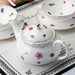 Elegant Japanese Bone China Tea Set with Black Teacups - Luxurious Tea Experience for Two