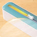 Multifunctional Kitchen Wrap Organizer and Cutter for Foil, Cling Film, and Parchment Paper