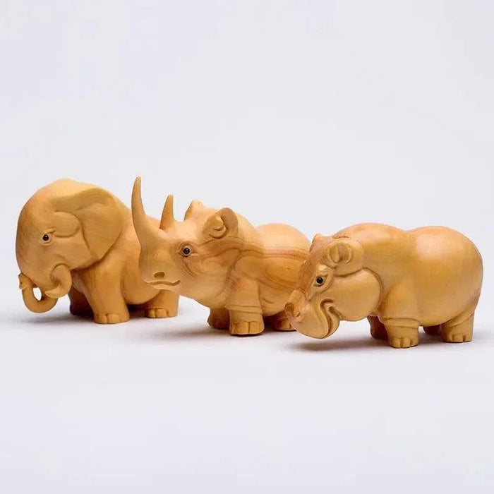 Handcrafted Wooden Wildlife Figurines: Distinctive Rhino, Hippo, and Elephant Decor for Home and Travel