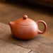 Authentic Artisan Yixing Purple Clay Teapot with Built-In Strainer for a Premium Puer Tea Experience