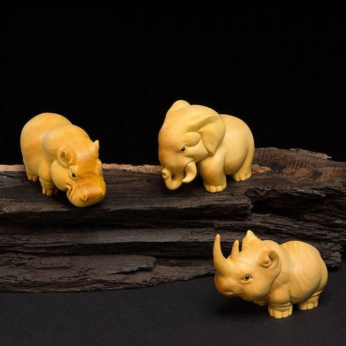 Handcrafted Wooden Wildlife Figurines: Distinctive Rhino, Hippo, and Elephant Decor for Home and Travel