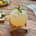 Sophisticated Round Cocktail Glass with Elegant Wooden Stand - Ideal for Creative Drinks and Smoothies