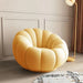 Versatile Rotating Pumpkin Plush Chair - Stylish Lounge Seating for Modern Spaces