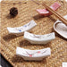 Elegant Japanese Plum Blossom Ceramic Chopstick Rest for Stylish Dining