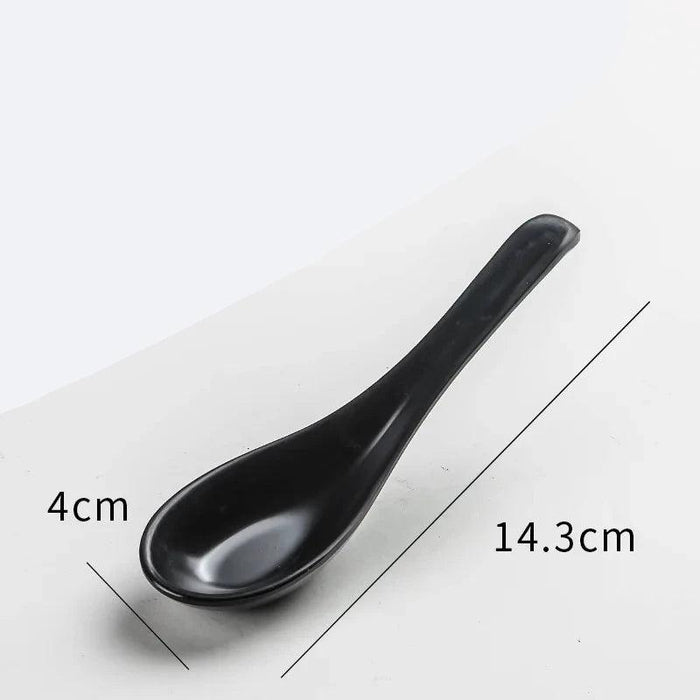 Sophisticated Black Melamine Serving Spoon with Elegant Japanese Porcelain Motif