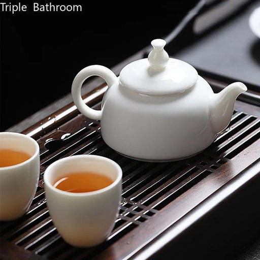 Exquisite Handcrafted Dehua White Porcelain Teapot with Integrated Filter - Refined Chinese Tea Set for Home and Travel