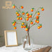 Festive Red Pomegranate Floral Branch with Lush Greenery