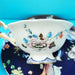 Elegant Midnight Blossom Crane Bone China Tea Set with Golden Touches