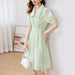 Summer Elegance: Light Green Smocked A-Line Dress with Belt