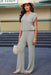 Elegant Knit V Neck Sweater and Flowing Trousers Ensemble