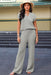 Elegant Knit V Neck Sweater and Flowing Trousers Ensemble