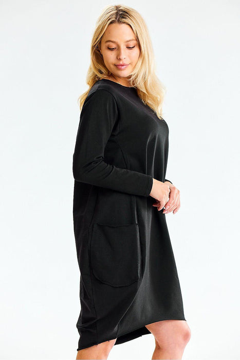 Chic Relaxed Midi Dress with Convenient Pockets