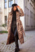 Elegant Long Women's Coat with Decorative Belts by Roco Fashion