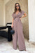 Chic Wide-Leg Jumpsuit with Flared Sleeves and Statement Belt