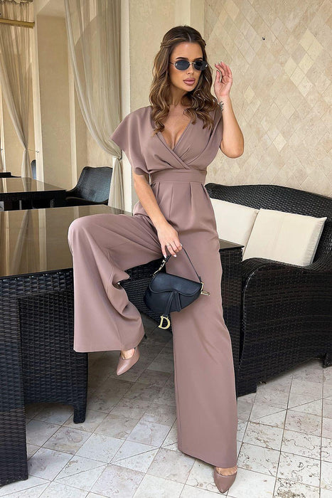 Chic Wide-Leg Jumpsuit with Flared Sleeves and Statement Belt