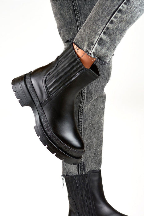 Sleek Eco-Friendly Black Leather Ankle Boots for Effortless Style