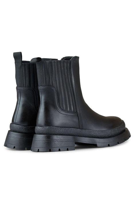 Sleek Eco-Friendly Black Leather Ankle Boots for Effortless Style