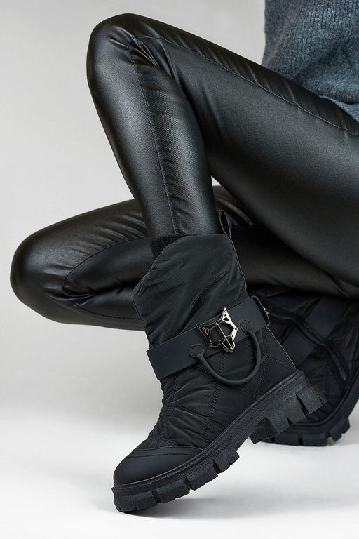 Winter Chic: Sophisticated Black Snow Boots for Cold Weather Style