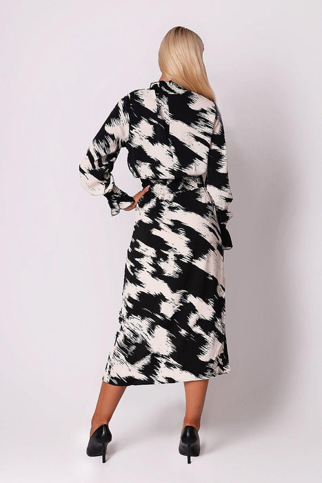 Sophisticated Black and White Ruffled Midi Dress