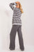 Sophisticated Striped Ribbed Knit Outfit with High-Waisted Trousers