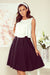 A flared black midi skirt with pockets