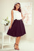 A flared black midi skirt with pockets