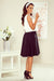A flared black midi skirt with pockets