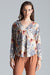 Chic Collarless V-Neck Long Sleeve Shirt with Stylish Snap Buttons and Unique Print