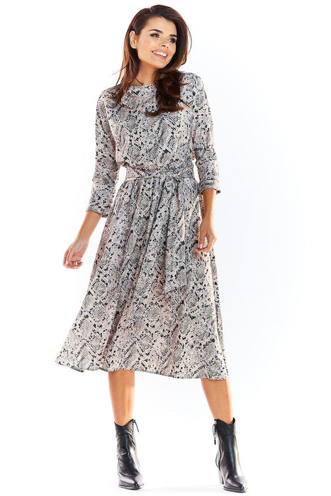 Chic Midi Dress with Stylish Prints and Complementary Waist Belt