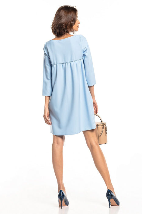 Chic Tessita Daydress: Stylish Pleated Design with Practical Pockets